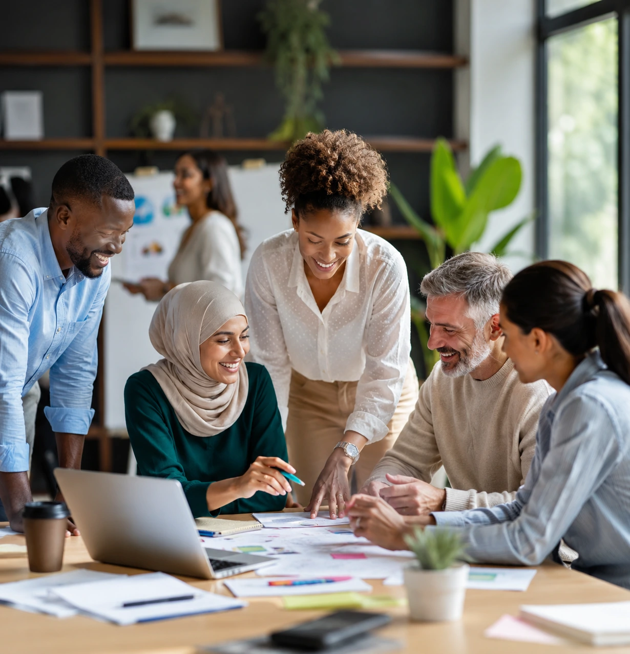 Diverse professionals collaborating on partnerships, employment pathways and social impact initiatives